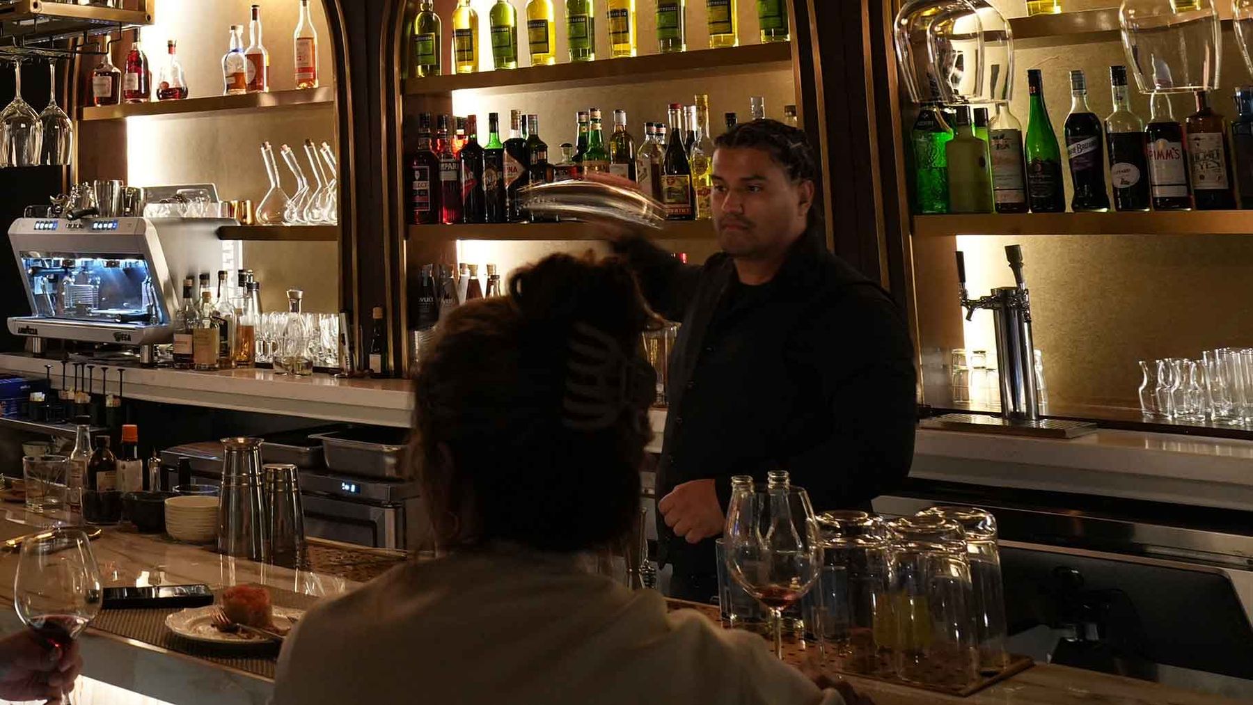 Justin working behind the Braseria bar